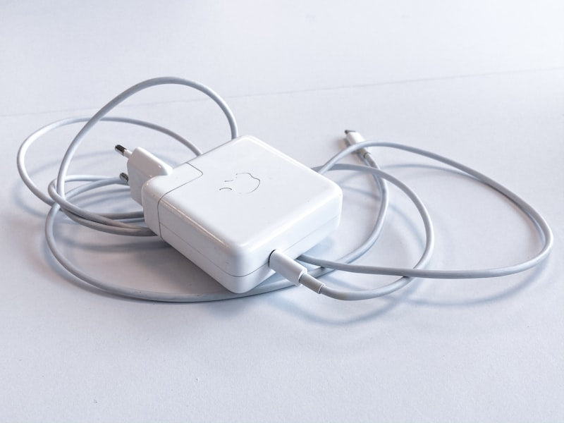 Wireless charging pad on desk with phone